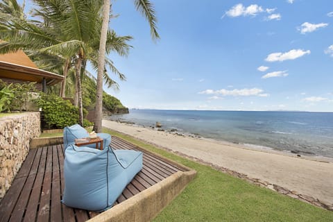 On the beach, sun loungers, beach towels