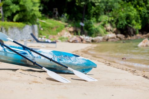 On the beach, sun loungers, beach towels