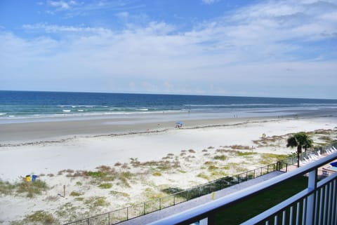 On the beach, sun loungers, beach towels