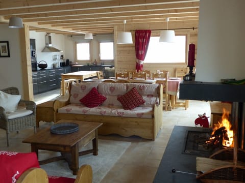 Living room, dining room/kitchen at the back