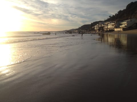 On the beach, sun loungers, beach towels