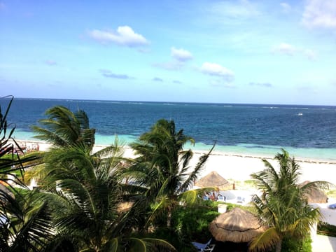 On the beach, sun loungers, beach towels