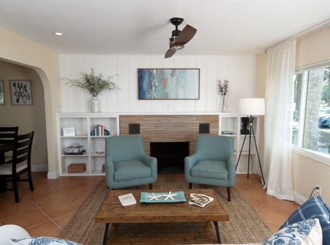 Warm and inviting living room gathering space, all beautifully refurnished