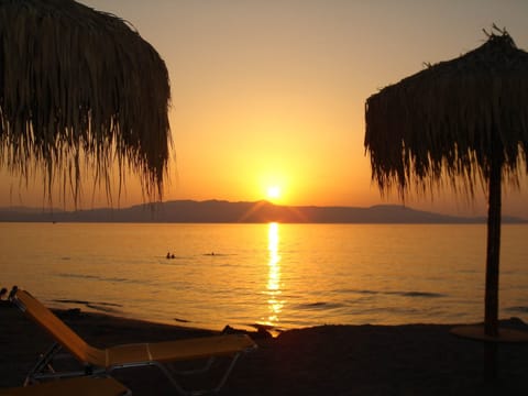 On the beach, sun loungers