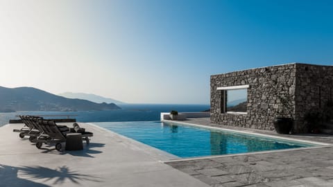 Outdoor pool, an infinity pool, sun loungers