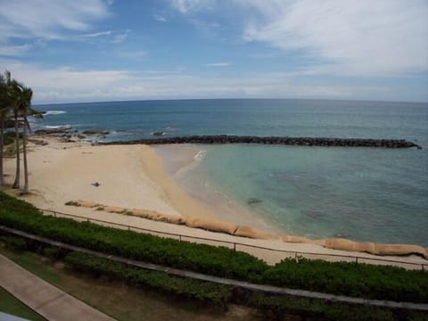 On the beach, sun loungers, beach towels