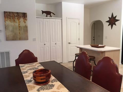 Authentic Italian black walnut dining room table seats 6 and extends for guests.