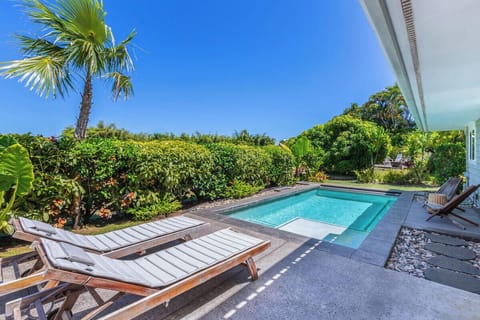 Take a refreshing dip in the pool and soak up the Hawaiian sun.