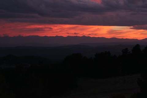 Sunset over the Sangre de Cristos.  Soak it up in the hot tub!