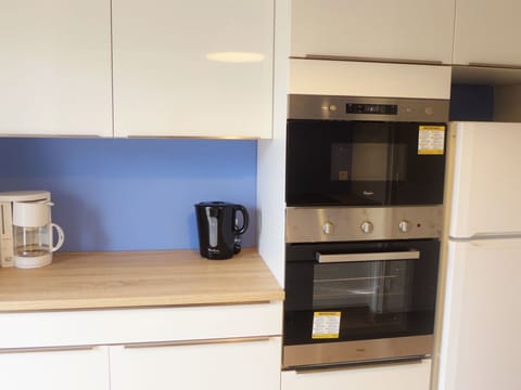 Property, Room, Cabinetry, Furniture, Kitchen, Microwave Oven, Countertop, Small Appliance, Home Appliance, Kitchen Appliance