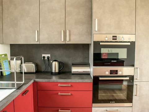 Countertop, Cabinetry, Furniture, Kitchen, Kitchen Stove, Drawer, Chest Of Drawers, Kitchen Appliance, Wood, Tap