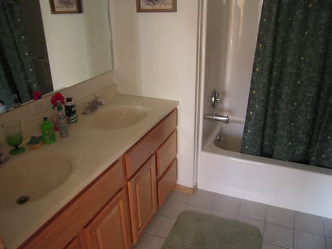 Combined shower/tub, hair dryer, towels, soap