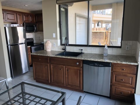 1st Floor Kitchen with dishwasher, fridge, double oven & microwave