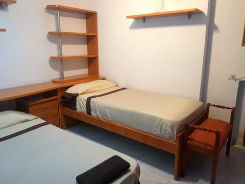 Desk, iron/ironing board, bed sheets, wheelchair access