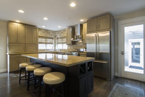 Kitchen door that leads you to the backyard deck
