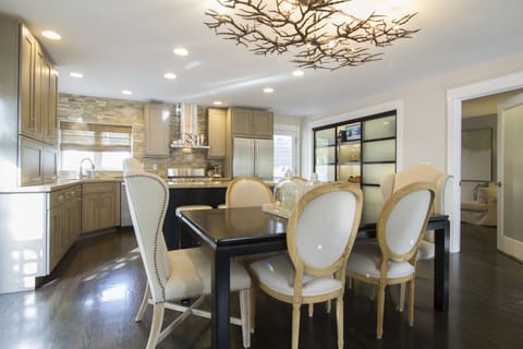 Glass Pantry doors where dishes are kept plus a small TV