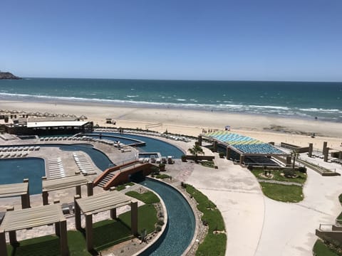 On the beach, sun loungers, beach towels