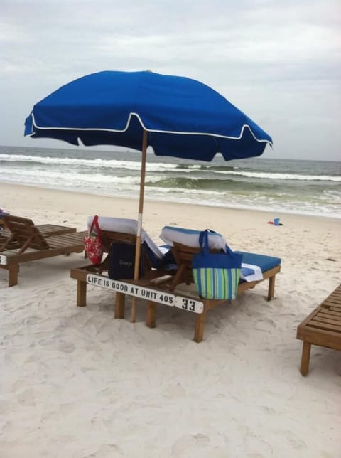 On the beach, sun loungers, beach towels