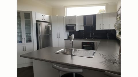 Oven, dishwasher, dining tables