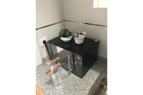 Microwave, coffee/tea maker, toaster, cookware/dishes/utensils