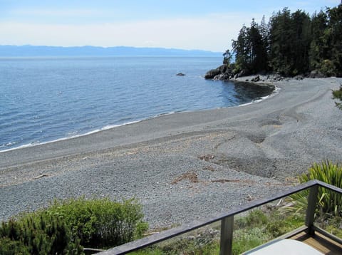 The beach as viewed from the upper deck at the house. That is the hot tub at the bottom of the photo.