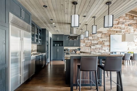 Chefs kitchen with bar seating