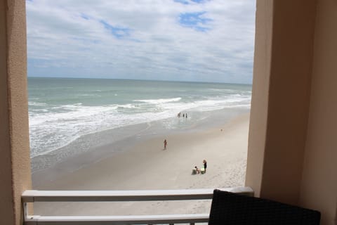 On the beach, sun loungers, beach towels