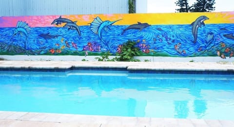 Awesome heated pool and backyard mural