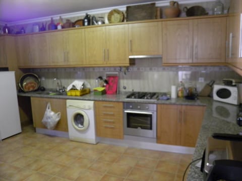 Fridge, oven, cookware/dishes/utensils