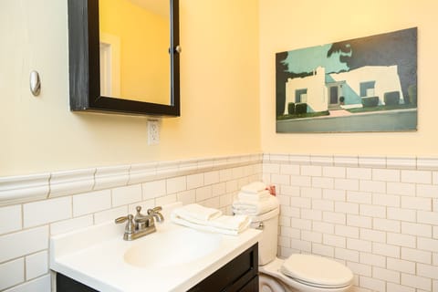 subway tiled bathroom with walk-in shower