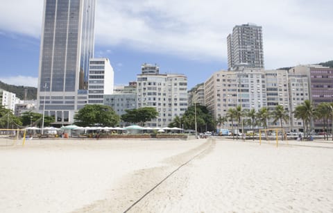 On the beach, sun loungers, beach towels