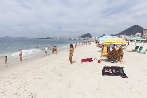 On the beach, sun loungers, beach towels