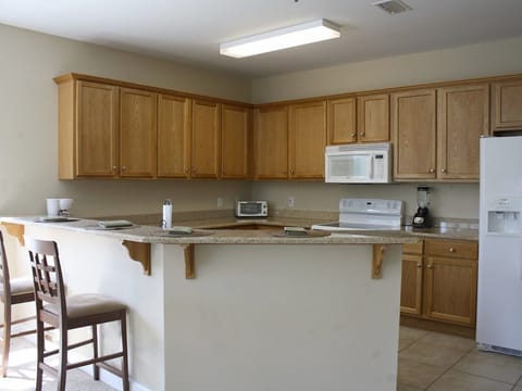 Fully equipped kitchen with full size appliances.
Typical 3 BR unit