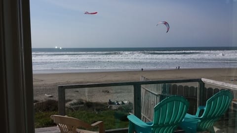 View from inside SurfSounds.  Deck with windscreen panels in foreground.
