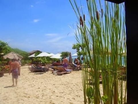 On the beach, sun loungers, beach towels