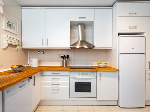 Kitchen, Cabinetry, Room, Countertop, Furniture, Property, Yellow, Orange, Interior Design, Building