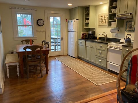 lovely eat-in kitchen with table comfortably seating six people