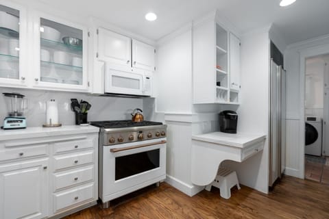 Beautiful new stove, countertops, deep sink. dishwasher, microwave, refrigerator