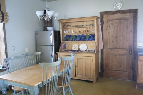 Our cozy cabin has a nice sized fridge for all your goodies and a chef's kitchen