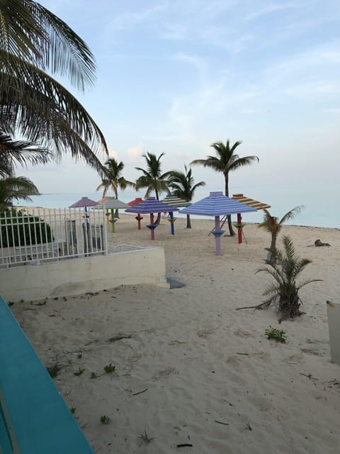 On the beach, sun loungers, beach towels