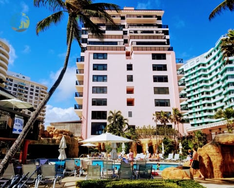 A heated pool, pool umbrellas