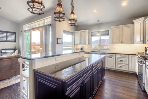 Chefs kitchen with huge island open to all the fun! Bar seating for 4