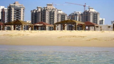 the building sight from the beach
