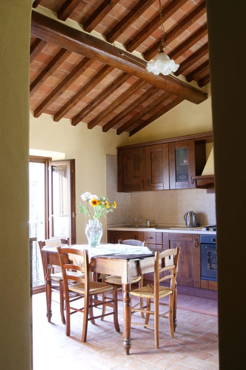 The livingroom-kitchen. The apartment is at the first floor. 