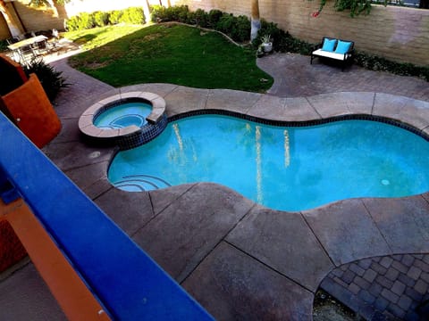 Looking down on the backyard from the master balcony