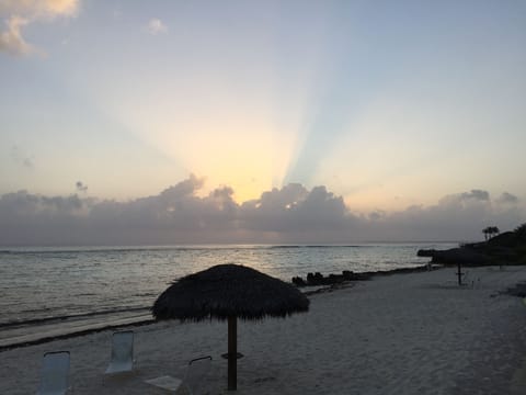 On the beach, sun loungers, beach umbrellas, beach towels