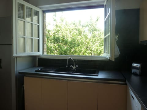 Large kitchen opens to the garden