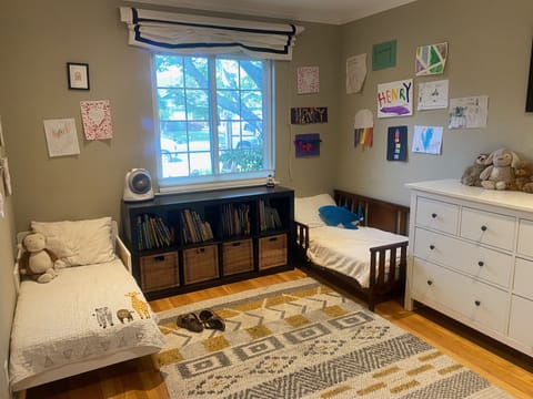 Kid's room with two toddler beds