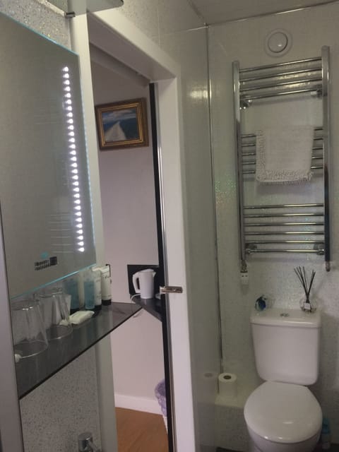 New en-suite , toiletries provided, towels, shampoo, conditioner, shower gel cap