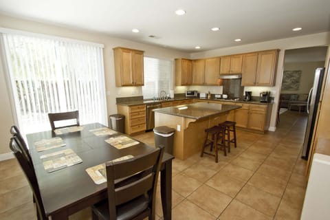 Breakfast nook adjoining kitchen with 6 person dining table